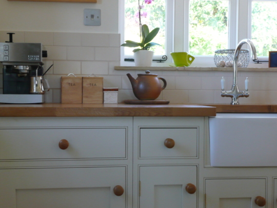 Painted tulipwood kitchen with oak worktops