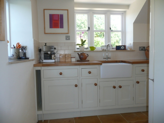 Painted tulipwood kitchen with oak worktops