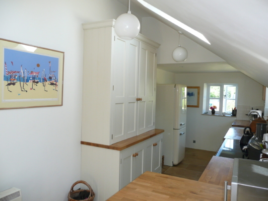 Painted tulipwood kitchen with oak worktops