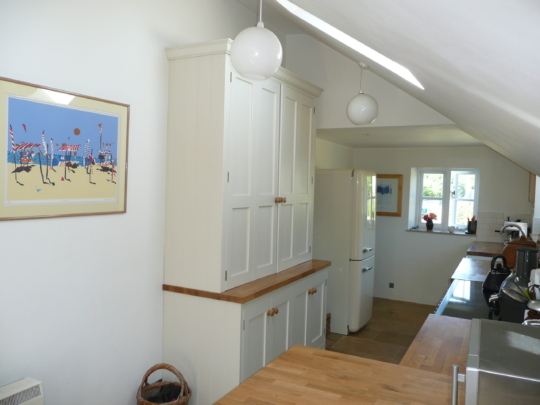 Painted tulipwood kitchen with oak worktops