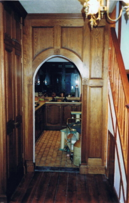 Dark oak hallway panelling