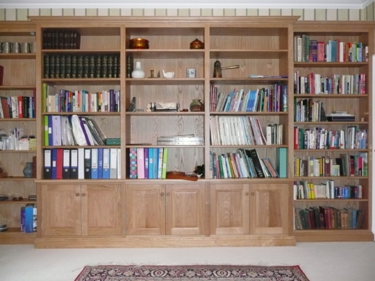 Oak break fronted shelves and cupboards