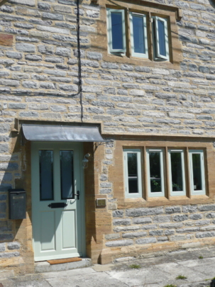 Painted hardwood front door and windows