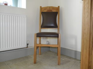Oak, walnut, brass and leather hall chair