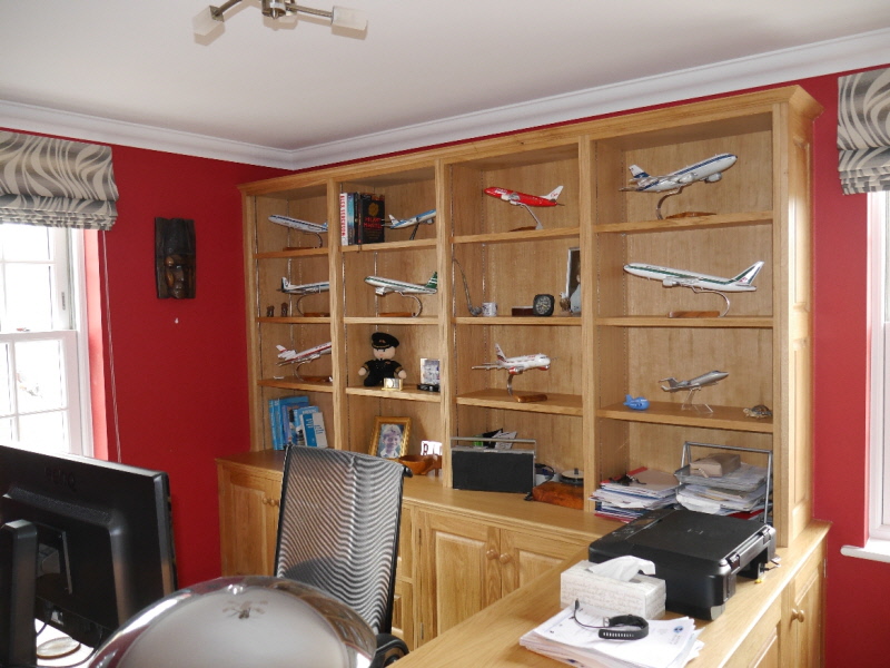 Oak panelled workstation and display shelves