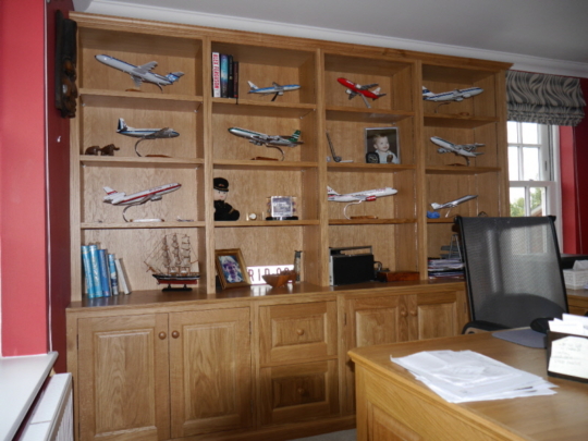 Oak panelled workstation and display shelves