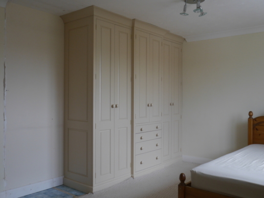 Painted breakfronted fitted wardrobe
