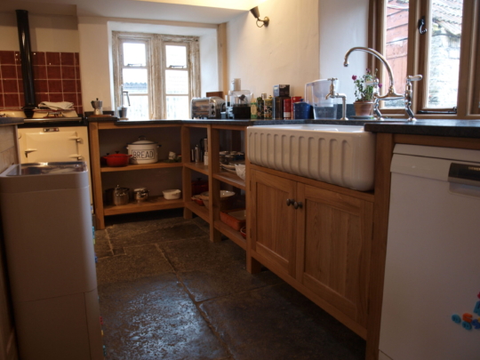 Solid oak sink cupboard and shelving