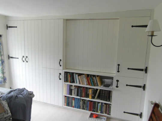 Painted storage for a Dorset cottage spare room