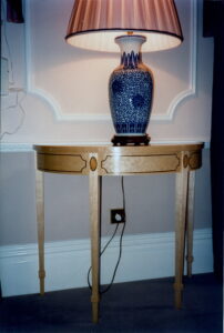 Walnut inlaid birdseye maple hall table