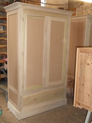 One of four wardrobes in unfinished tulipwood and MDF