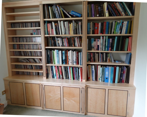 Maple bookcase with framed inlaid birdseye maple panels